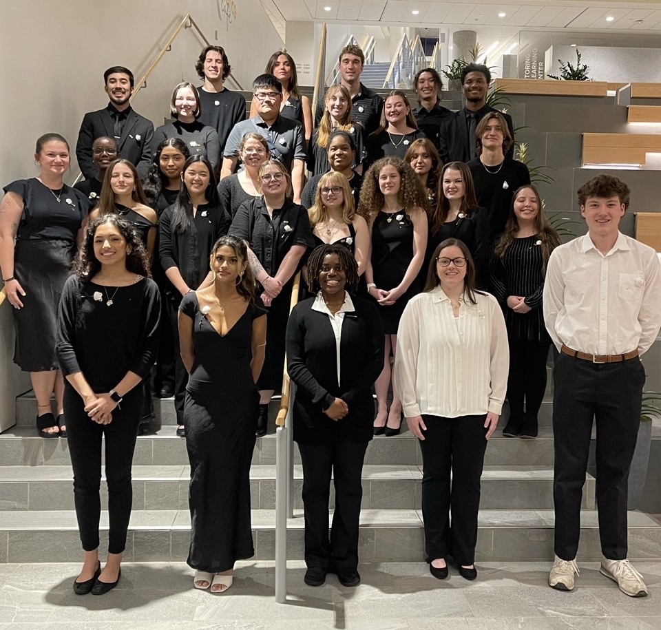 Gamma Pi Members standing together