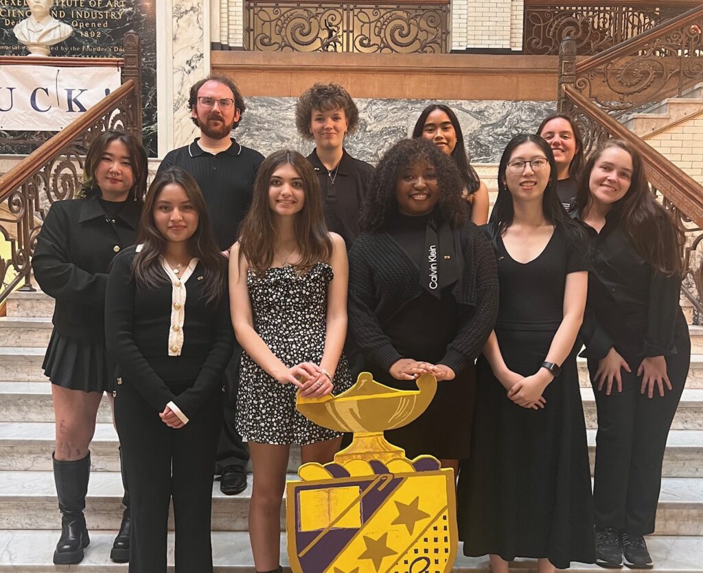 Gamma Xi members standing together