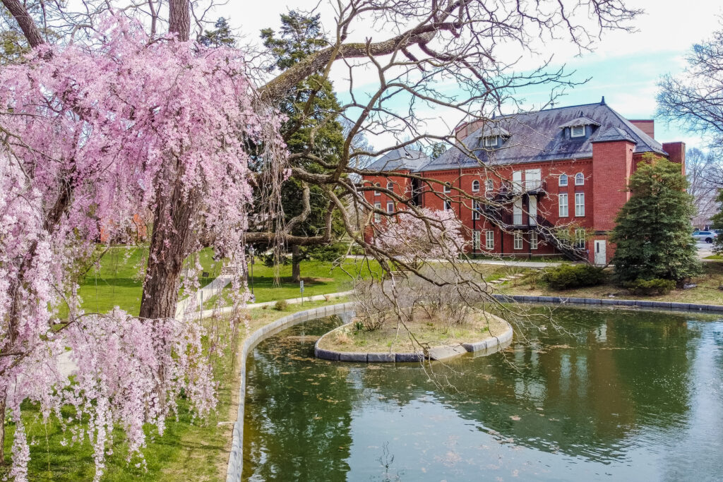 Pond and building on campus at Millersville University